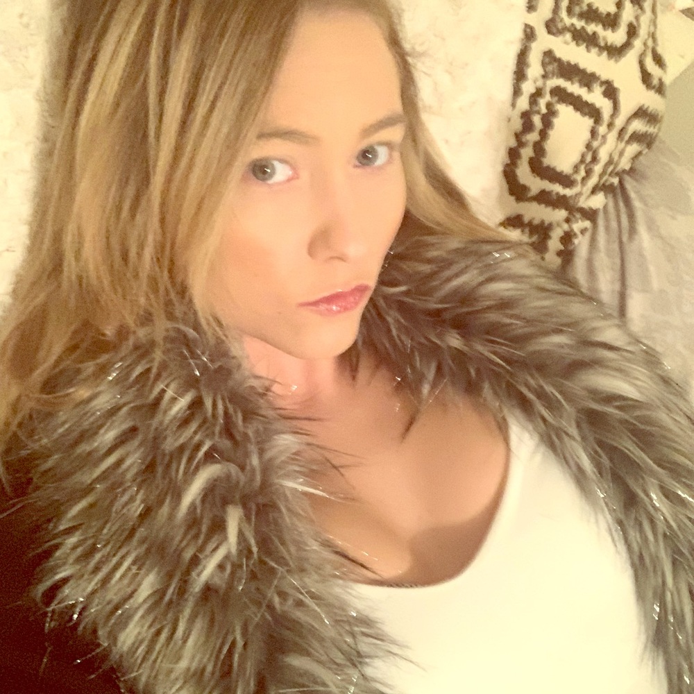 Micheal Kors puffy coat no sleeves